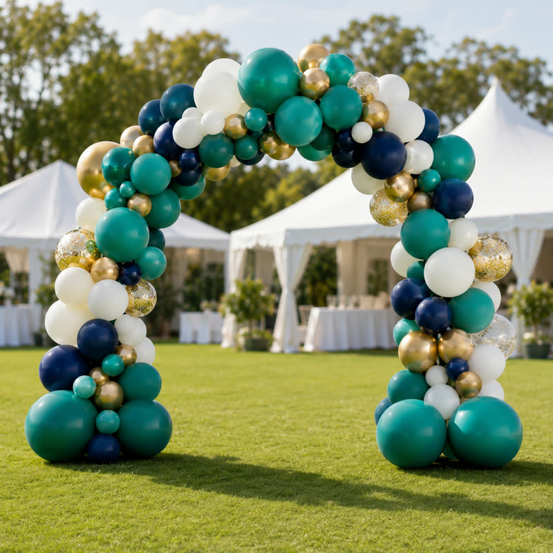 Full balloon arch in teal, navy, gold and white